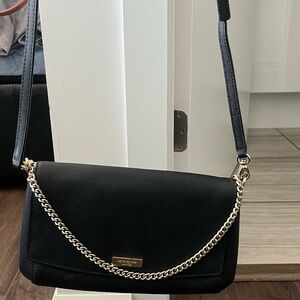 kate spade black crossbody with gold chain detail